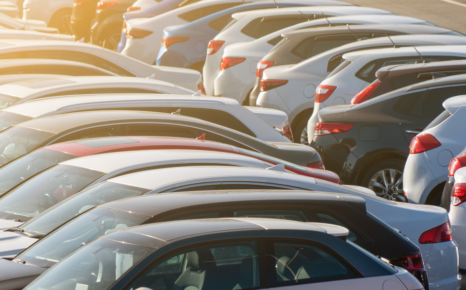 Dealership lot with lots of parked cars